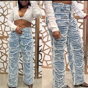 Distressed Blue Denim Jeans